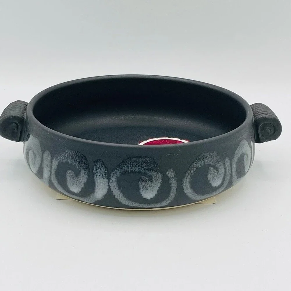 Black and white swirl glazed handmade baking dish by Jan's Pottery gouda recipe